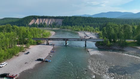 campers at the campground near the blankenship bridge over the north fork flathead river in montana, usa