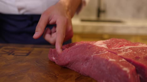 beef fillet being sliced and cut with knife