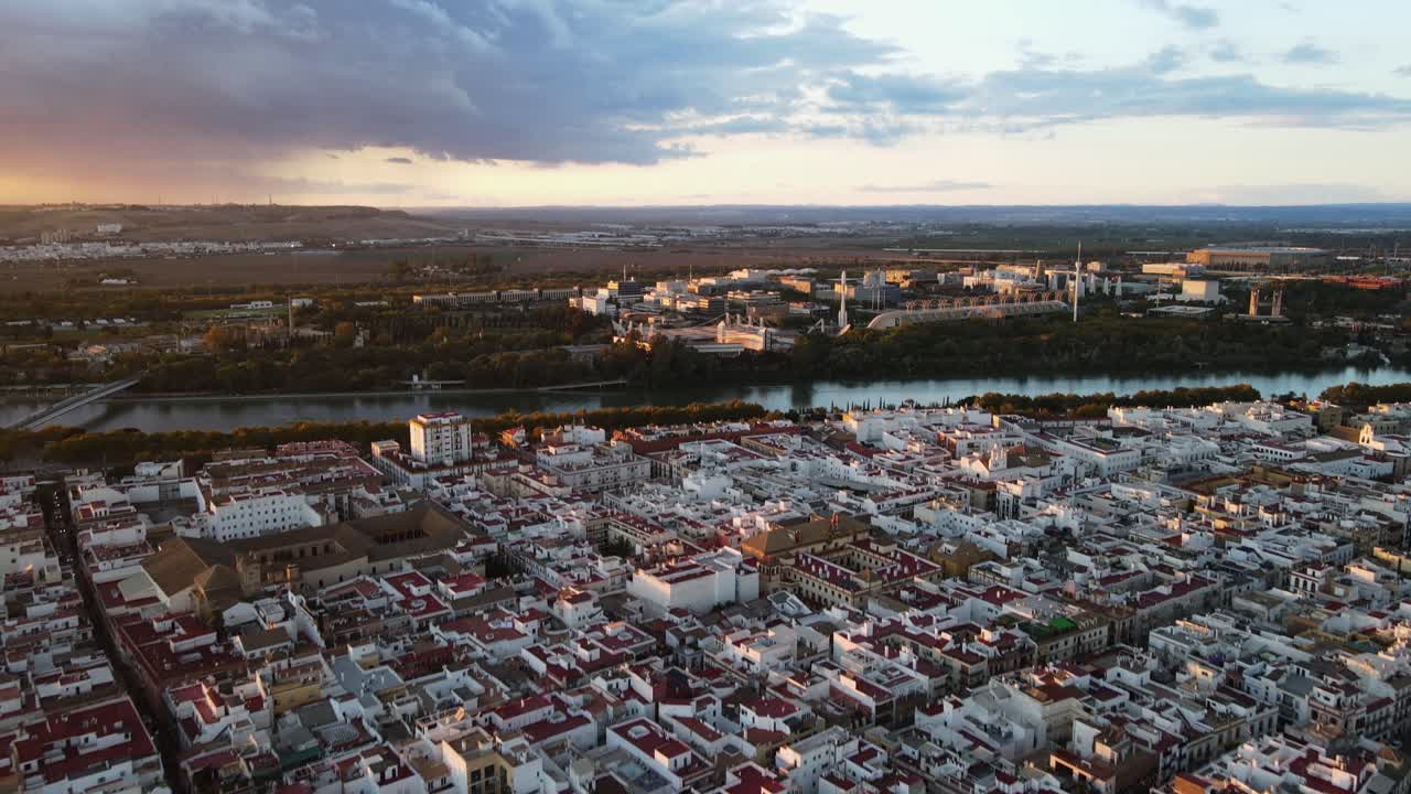 Aerial drone shot of Seville, the capital city of Spain's Andalusia region. Seville is known for its culture, heritage, and being the birthplace of Flamenco