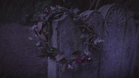 withered wreath on ancient gravestone in thunderstorm