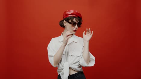 stylish woman in red beret and sunglasses