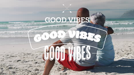 animation of good vibes text over smiling senior african american couple embracing at beach