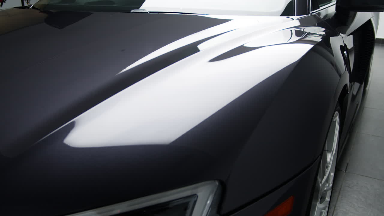 Smooth And Shiny Hood Of A Brand-new Sports Car. - close up