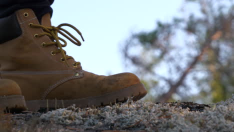 Close-up-shot-of-hiking-boots-in-forest-landscape