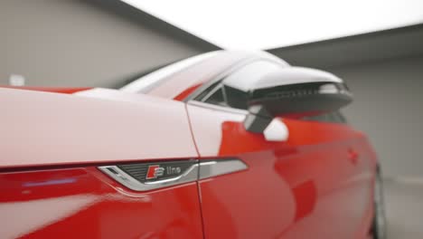 close-up of a red audi s-line coupe