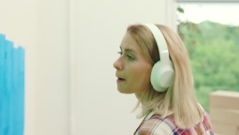 woman listening to music while moving