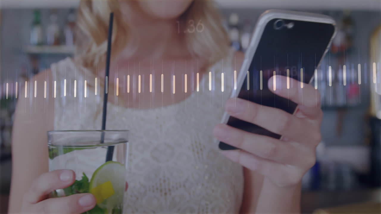 woman holding smartphone and cocktail in bar with audio waveform and numeric overlay for marketing
