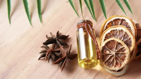 aromatic essential oil with dried lemon, cinnamon, and star anise