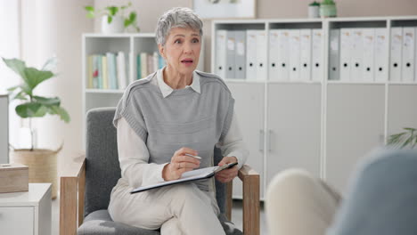 therapist talking with patient during counseling session