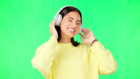 face, green screen and woman with headphones