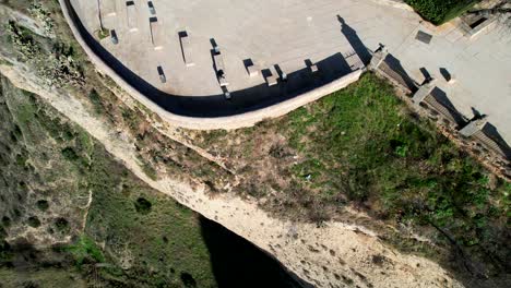 aerial pullback tilt up reveals stunning homes of ronda cliffs spain