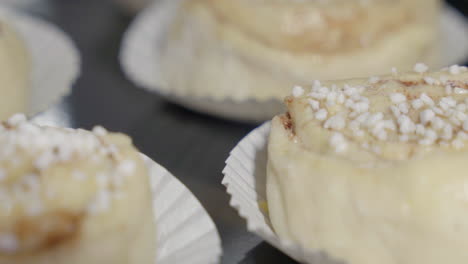 extreme close up of unbaked cinnamon buns