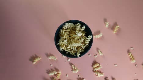 Top-view-clip-of-rotini-poured-and-scattering