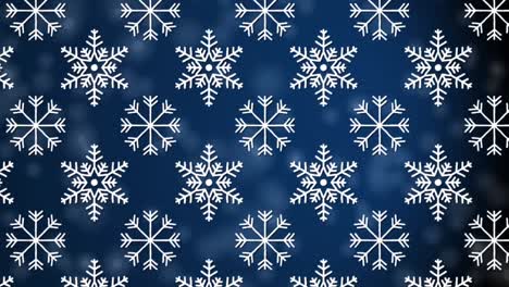 Digital-animation-of-snowflakes-icons-in-seamless-pattern-against-spots-of-light-on-blue-background