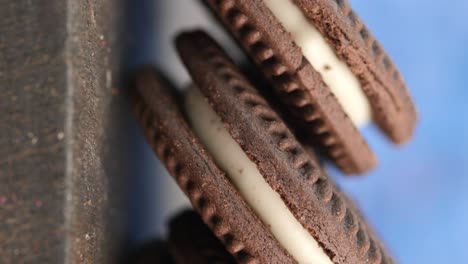 close-up of stacked chocolate cream-filled cookies