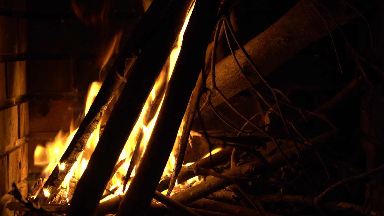 Chimney fire starting to burn with the logs