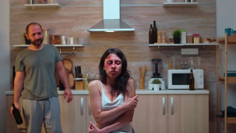 alcoholic man threating woman