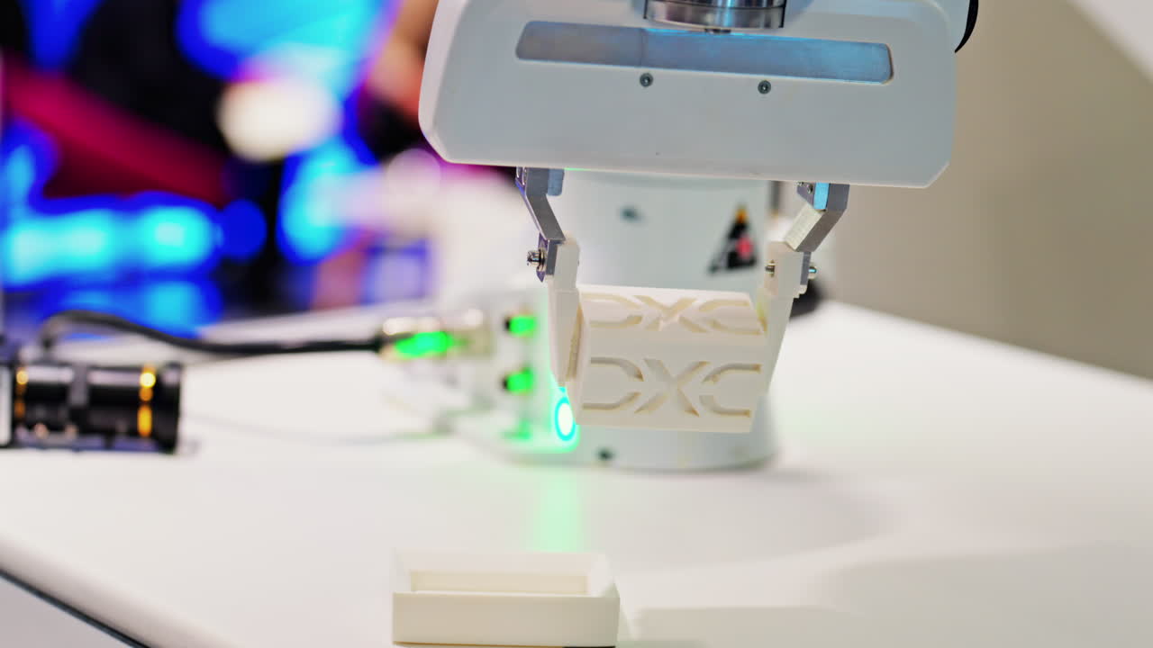 Cannes, France - February 15, 2025: Close up of robotic arm at a tech conference