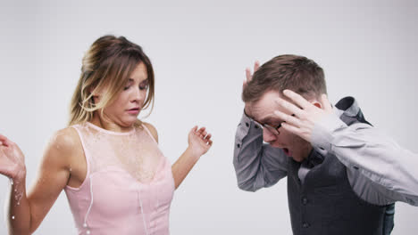 man spilling drink on women party slow motion wedding photo booth series