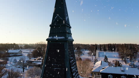 aerial pedestal up over historic church steeple, close up