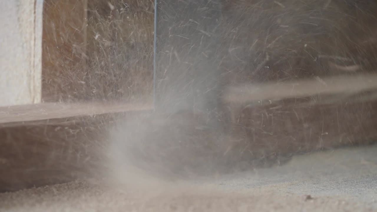 Wood being cut on a table saw