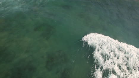 Beautiful-warm-tropical-Indian-Ocean-reef-Durban,-South-Africa,-aerial-drone