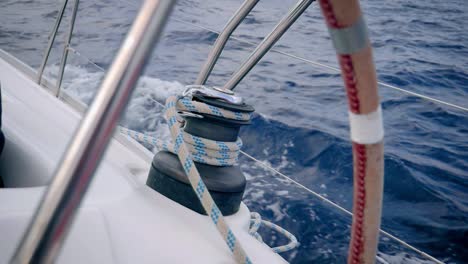 winch on a sailboat while sailing