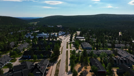 Aerial-view-over-the-main-street-in-the-Saariselka-village,-summer-in-Lapland