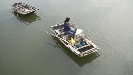 slow motion tilting shot of a traditional vietnamese fishing boat