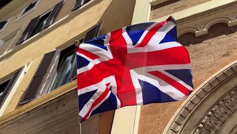 british flag flying from a building