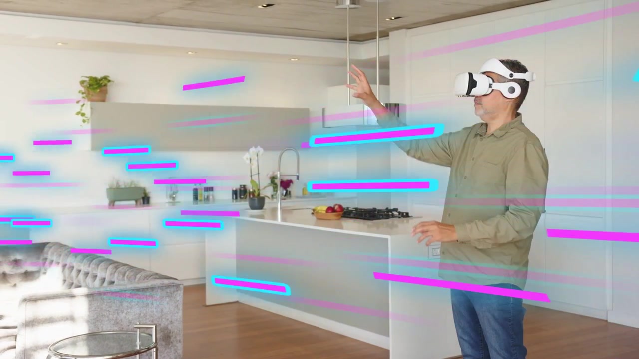 Muž s VR headsetem zvedá pravou ruku, vybírá virtuální uživatelské rozhraní, testuje technologii, navádějí ho neonové pruhy.