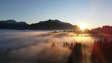 sunset and clouds over mountainous countryside