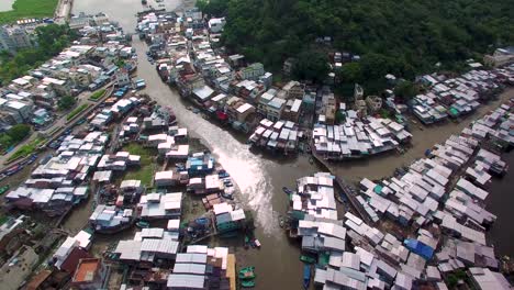 aerial god's eye view of tai o fishing village and canals at lantau island, hong kong