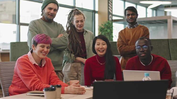 Group of Businesspeople Talking on Video Call during Meeting