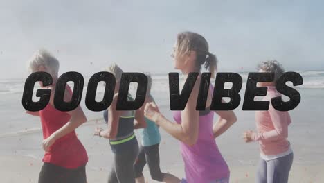 Animation-of-text-good-vibes,-in-black,-with-women-running-on-beach