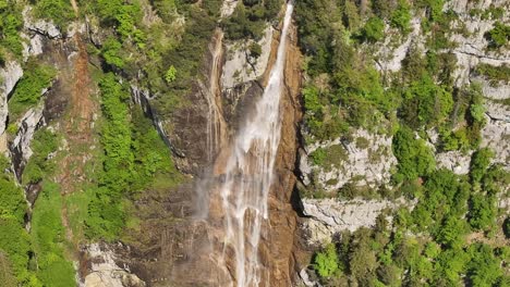 powerful seerenbachfälle stream cascades over steep alpine rock face