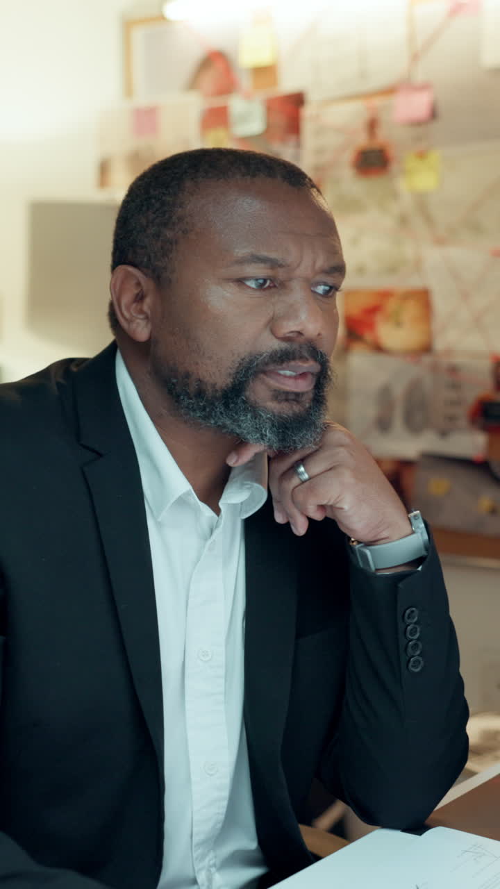 Thoughtful Businessman Contemplating and Looking Around in an Office