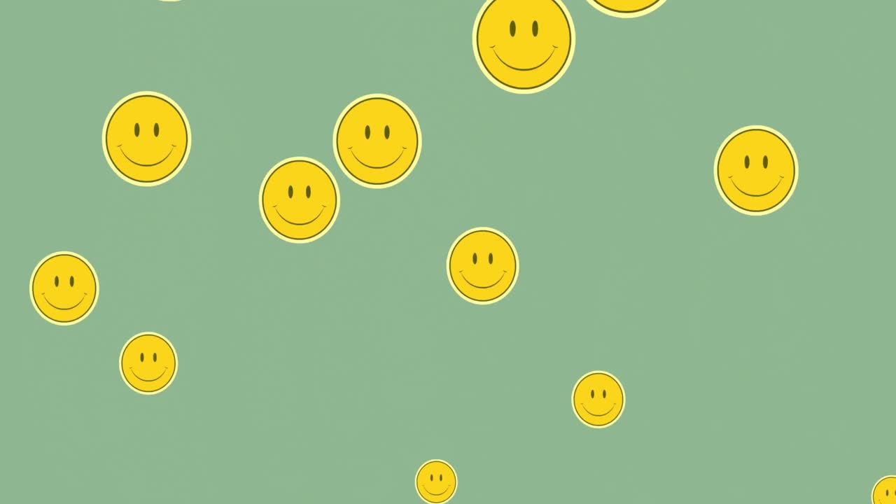 초록색 배경에 떠다니는 여러 개의 미소 짓는 얼굴 이모티콘