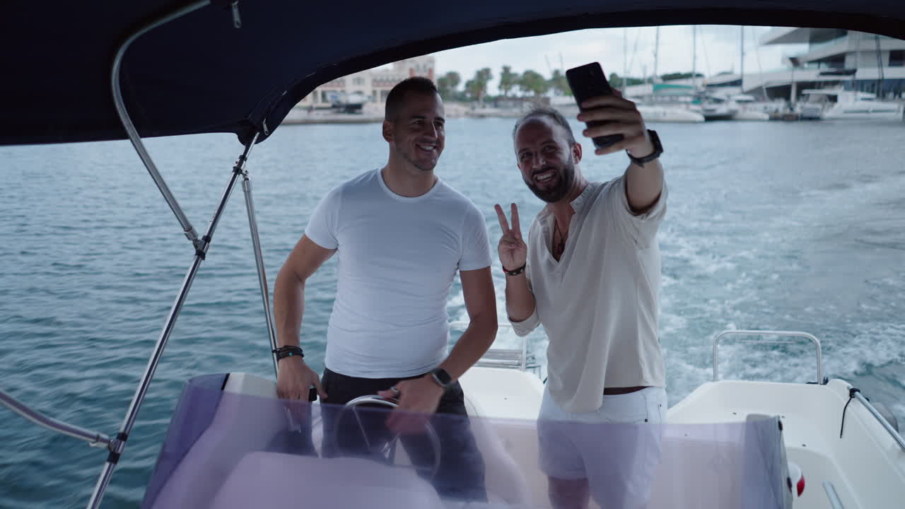 Two Men Taking a Selfie on a Boat