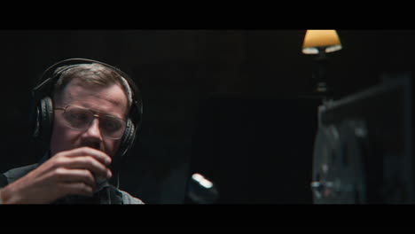 an intelligence officer listens to the wiretap recordings