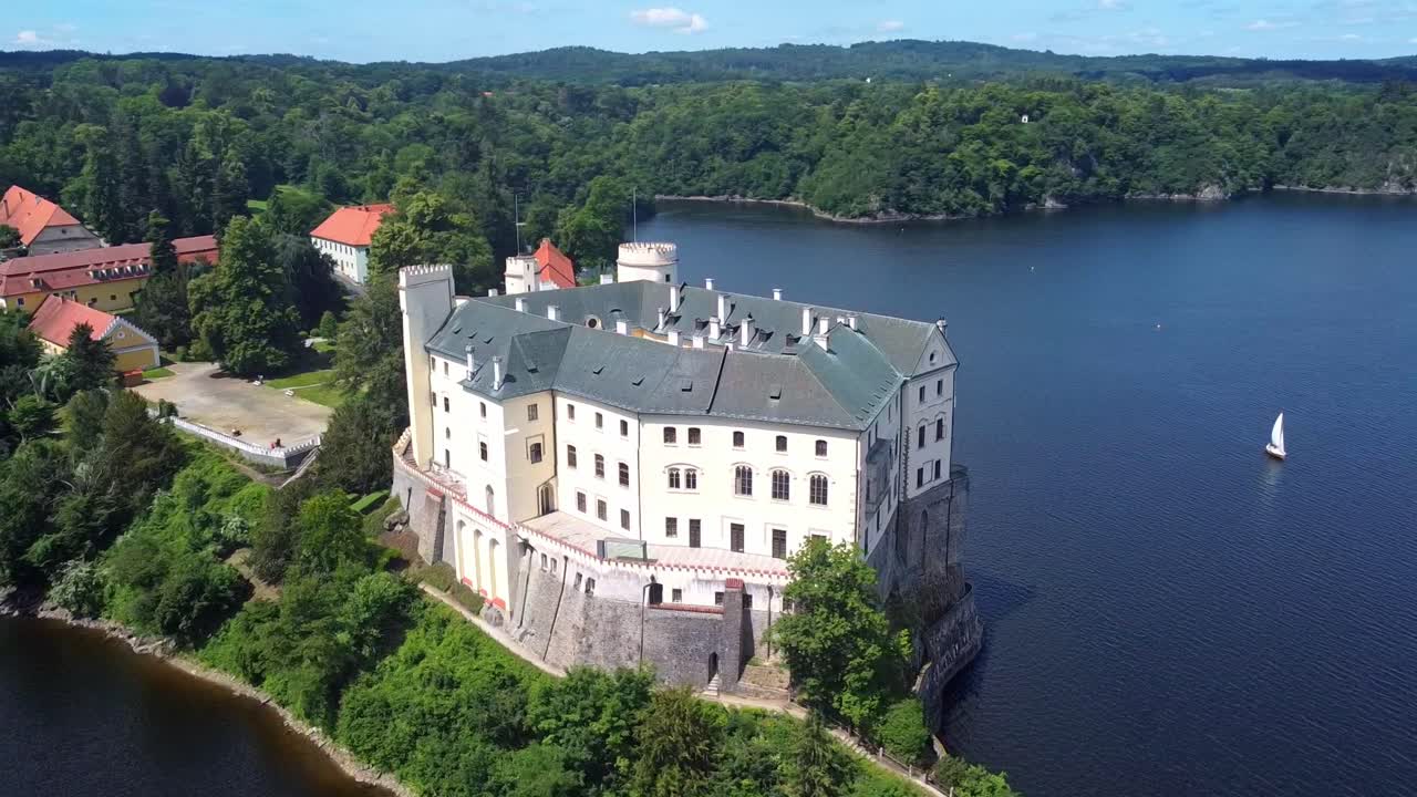 Orlik Castle (Zamek Orlik) - Manor House By Vltava River In Summer In Orlik nad Vltavou, Pisek, Czech Republic. - aerial shot