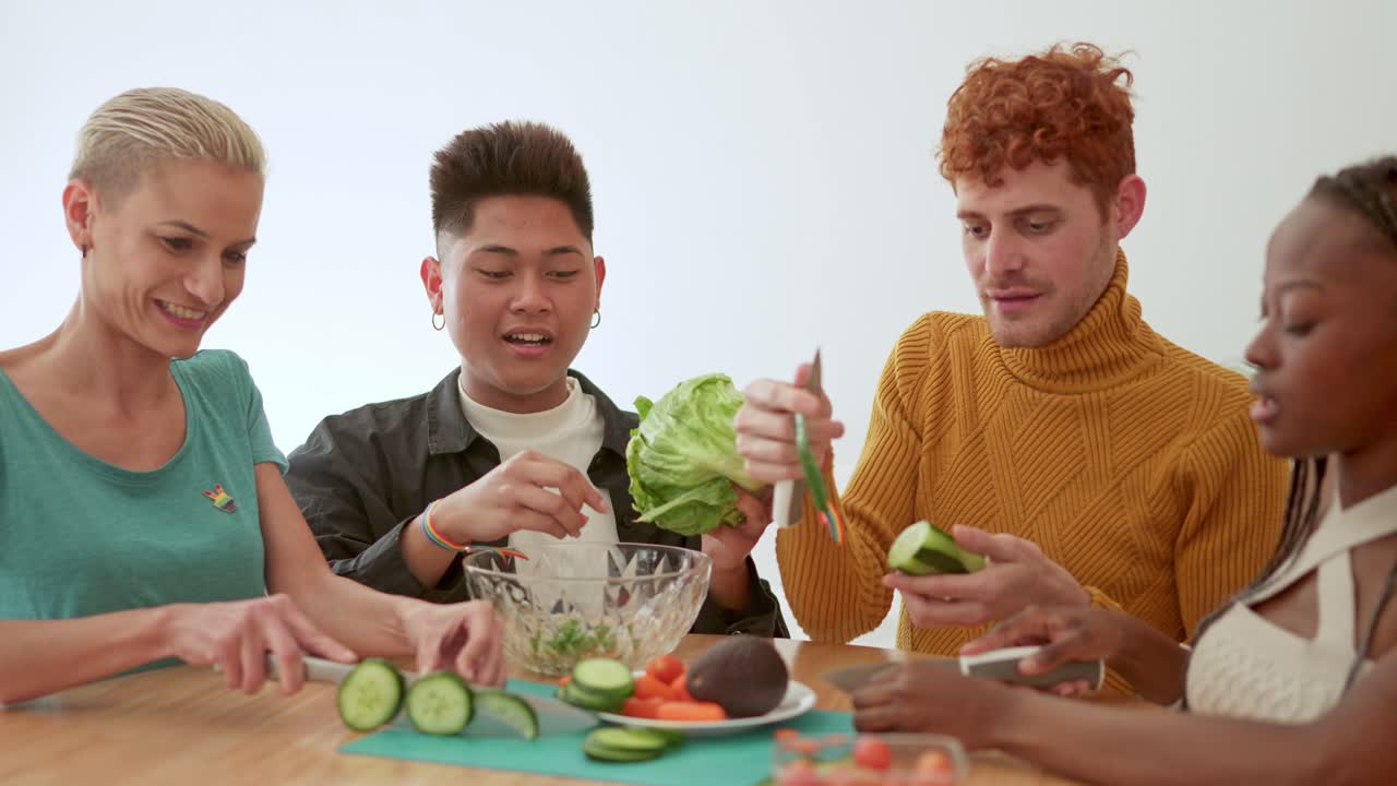 Diverse group of friends preparing a healthy salad