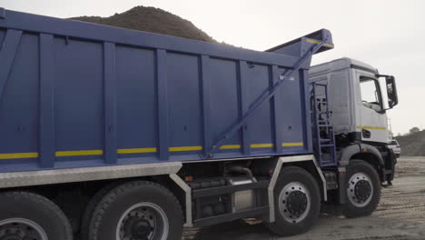 dump truck loading soil or gravel