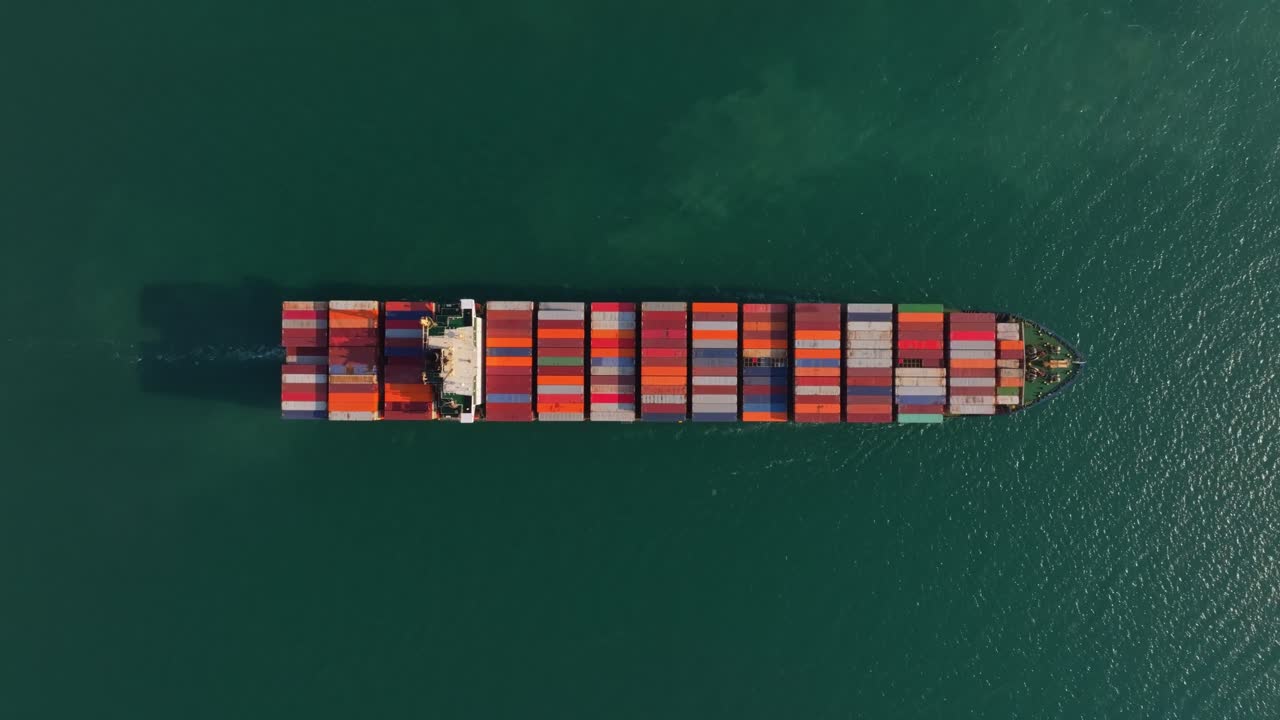 High-angle view of cargo ship departing shore, Thailand