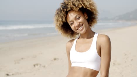 Portrait-Of-Girl-Smiling-On-Beach