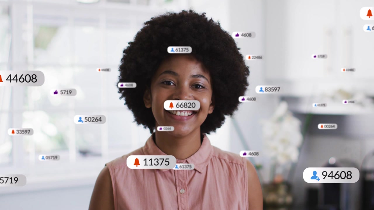 Woman smiling in kitchen, badges popping then clustering around head then dispersing for marketing