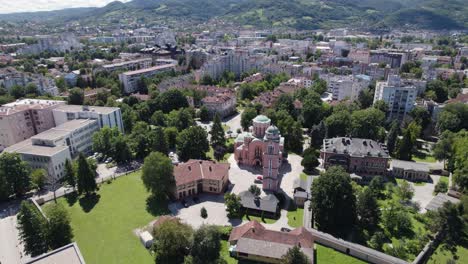 aerial establishing shot of serbian orthodox church of holy trinity, circling shot, banja luka