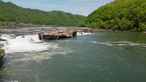 aerial reveal of kanawha falls and rock formations, west virginia