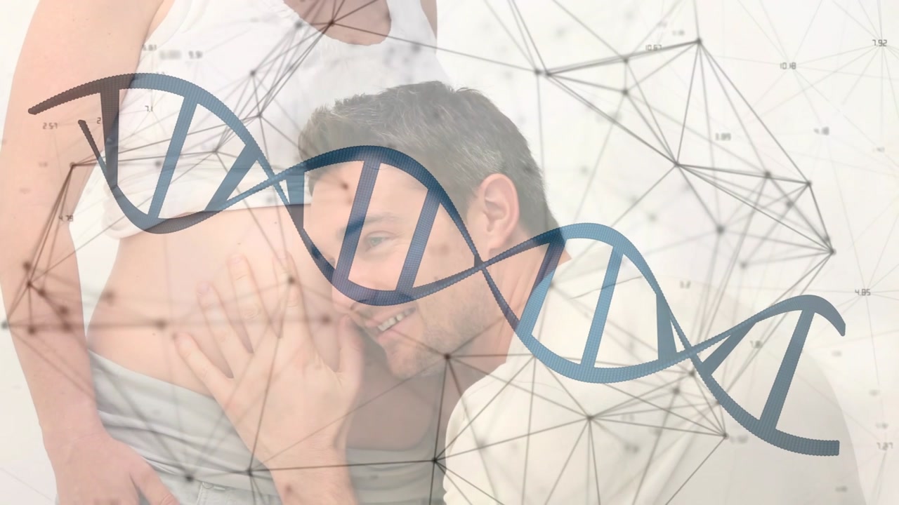 Man kneeling to pregnant woman lifting shirt, kissing belly for bonding while DNA helix overlaying