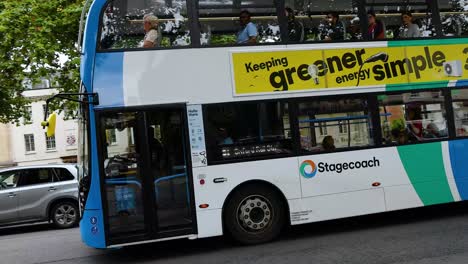 bus traveling through oxford, england, promoting green energy